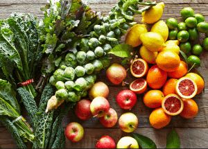 a group of fruits and vegetables on a wood surface Healthy Weight Loss Diets Barnsley